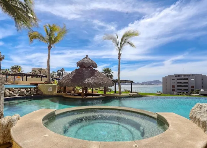 Stylish Coastal Retreat With Breathtaking Views, Resort Pool & Private Balcony